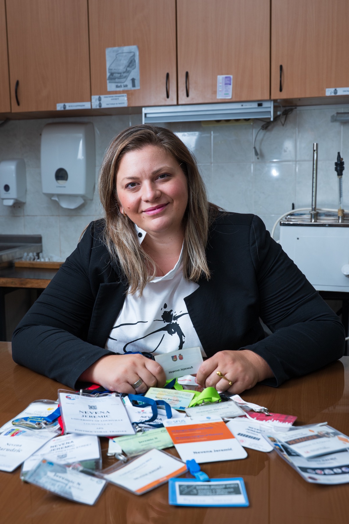 Dr. Nevena Jeremić with conference badges